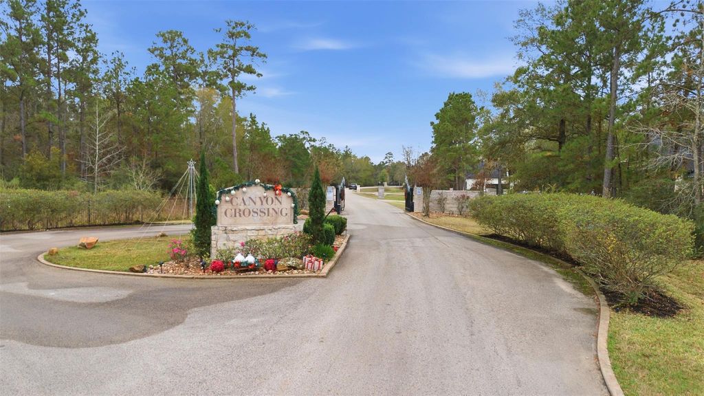 Photo of 12033 Oak Forest Lane, Conroe, TX 77385 (MLS # 54099645)