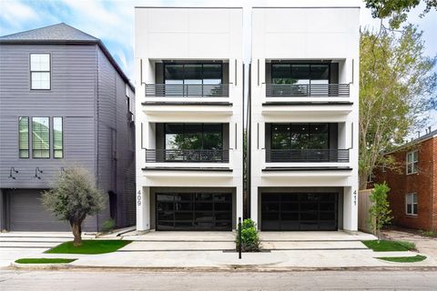 Photo of 409 W Saulnier Street, Houston, TX 77019 (MLS # 22231415)