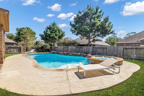 Photo of 14206 Rainier Peak Crossing, Conroe, TX 77384 (MLS # 8084400) Photo of 14206 Rainier Peak Crossing, Conroe, TX 77384 (MLS # 8084400)
