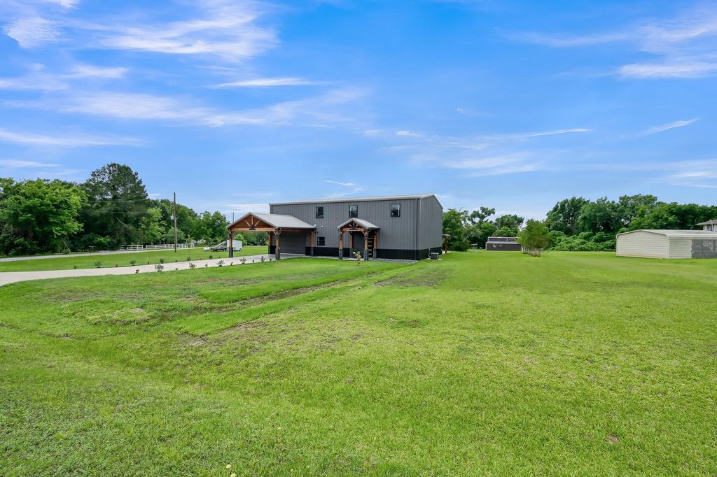 Photo of 12304 Maggie Lane, Willis, TX 77318 (MLS # 19650055)
