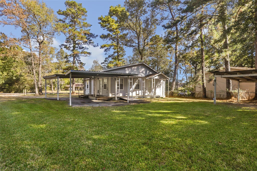 Photo of 23304 E Community Drive, New Caney, TX 77357 (MLS # 10565393)