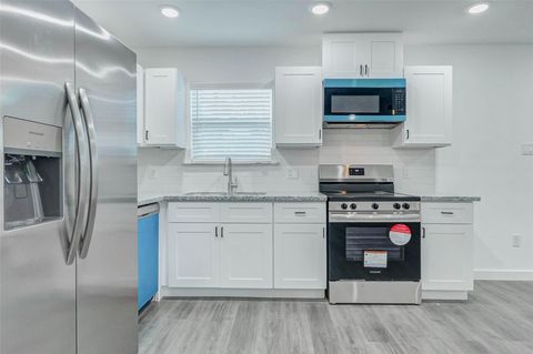 Photo of 8218 Bigwood Street #A, Houston, TX 77078 (MLS # 88927990)
