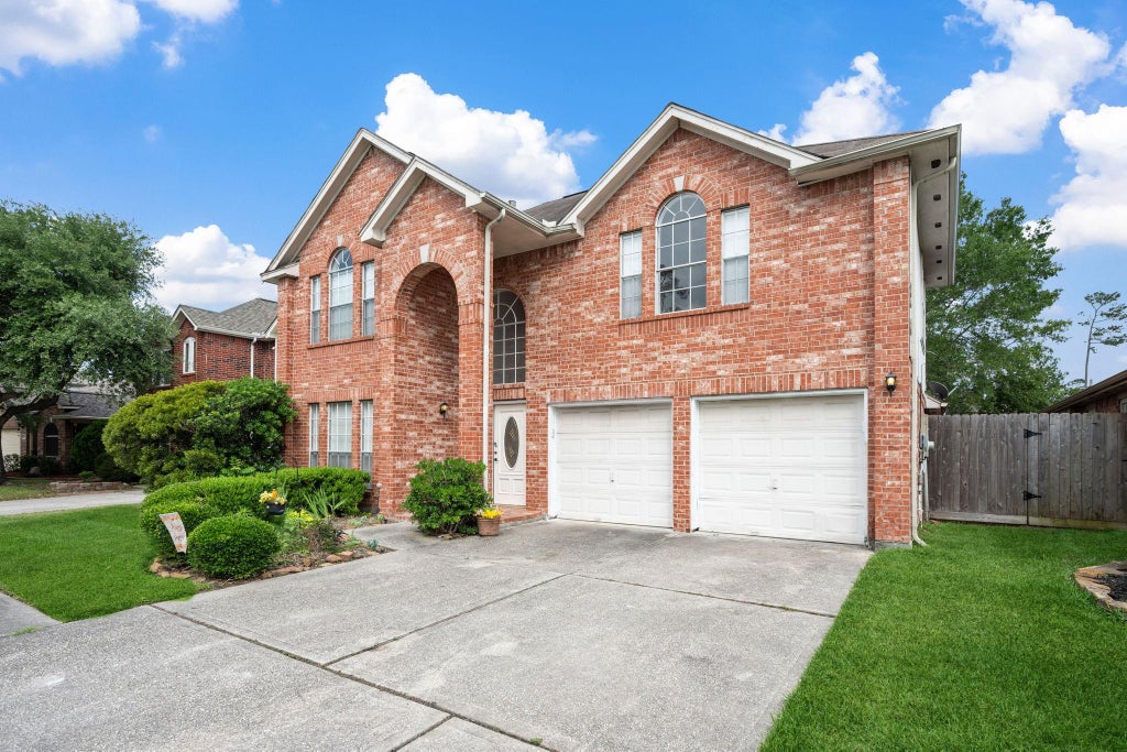 Photo of 26900 Castlecliff Lane, Kingwood, TX 77339 (MLS # 97560767)