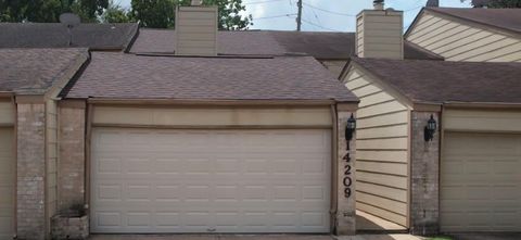 Photo of 14209 Briarsage Court #TH15, Houston, TX 77077 (MLS # 97443505)