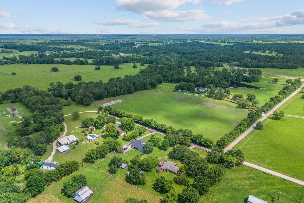 Photo of TBD Marion Lane, New Waverly, TX 77358 (MLS # 61964969)