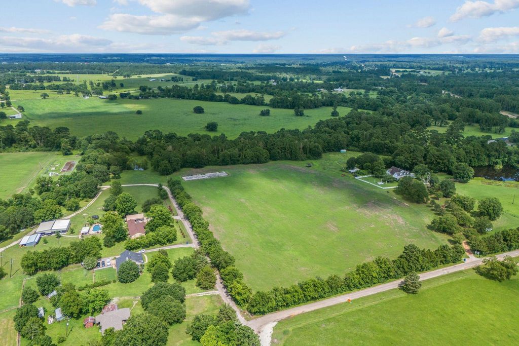 Photo of TBD Marion Lane, New Waverly, TX 77358 (MLS # 61964969)