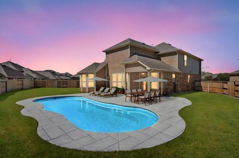 Photo of 11102 Mineral Island Lane, Richmond, TX 77406 (MLS # 74369436)