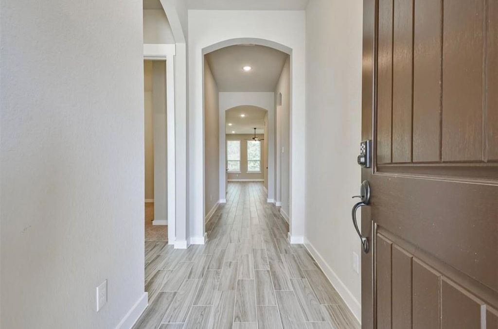 Photo of 10005 Red Beadtree Pl Pl, Conroe, TX 77385 (MLS # 40869666)