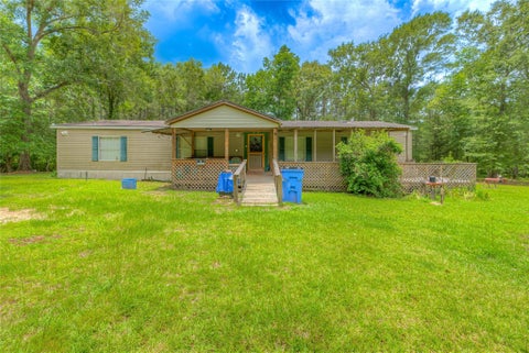 Photo of 657 Parrish Road, Livingston, TX 77351 (MLS # 67212865)