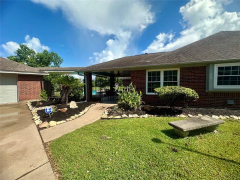 Photo of 1614 Avenue Q, Santa Fe, TX 77510 (MLS # 49136805)