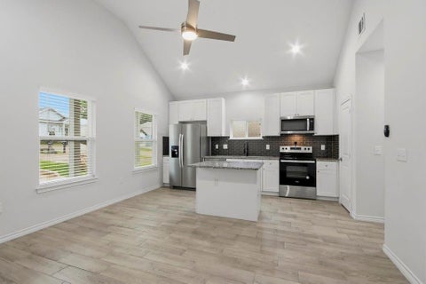 Photo of 16902 Balmoral, Montgomery, TX 77316 (MLS # 77379119)
