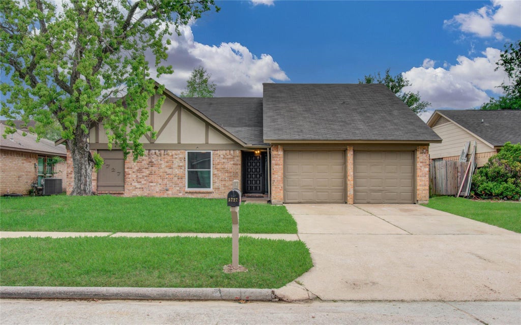 Photo of 5727 Longforest Drive, Houston, TX 77088 (MLS # 65468736)