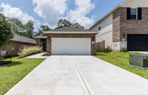 Photo of 18565 Meadow Point Lane, Conroe, TX 77316 (MLS # 69290433)