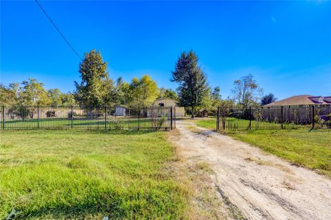 Photo of 910 County Road 3556, Cleveland, TX 77327 (MLS # 96200757) Photo of 910 County Road 3556, Cleveland, TX 77327 (MLS # 96200757)