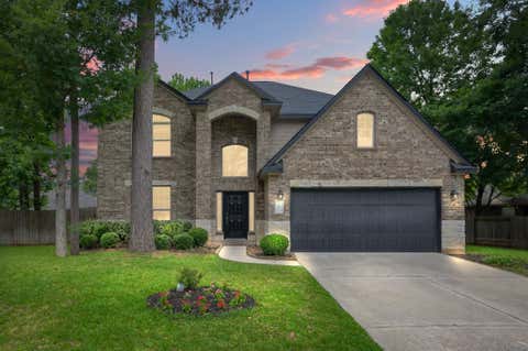 Photo of 4 Logan Creek Lane, Conroe, TX 77304 (MLS # 2693519)