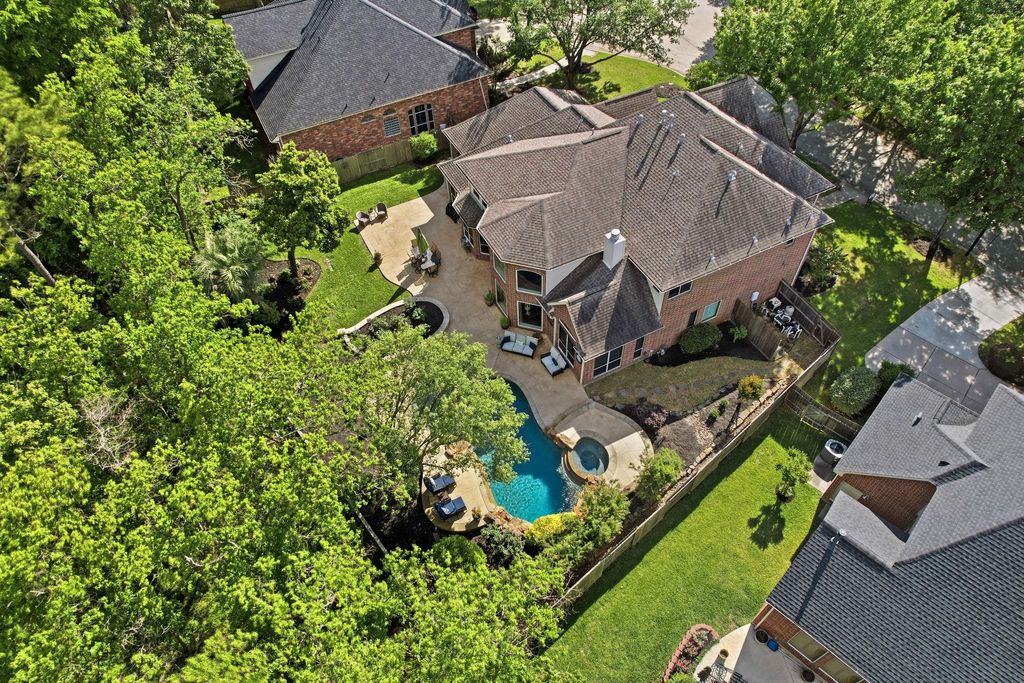 Photo of 6110 Country Falls Lane, Kingwood, TX 77345 (MLS # 68102195)