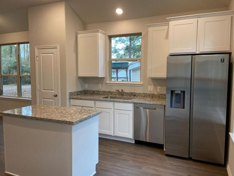 Photo of 11375 Underwood Street, Willis, TX 77318 (MLS # 82863784)