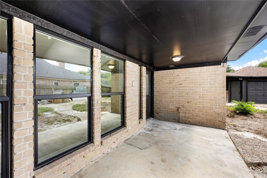 Photo of 10907 Braes Forest Drive, Houston, TX 77071 (MLS # 6414690)