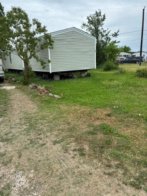 Photo of 115 Gulls Cut Street, Baytown, TX 77523 (MLS # 8797756)