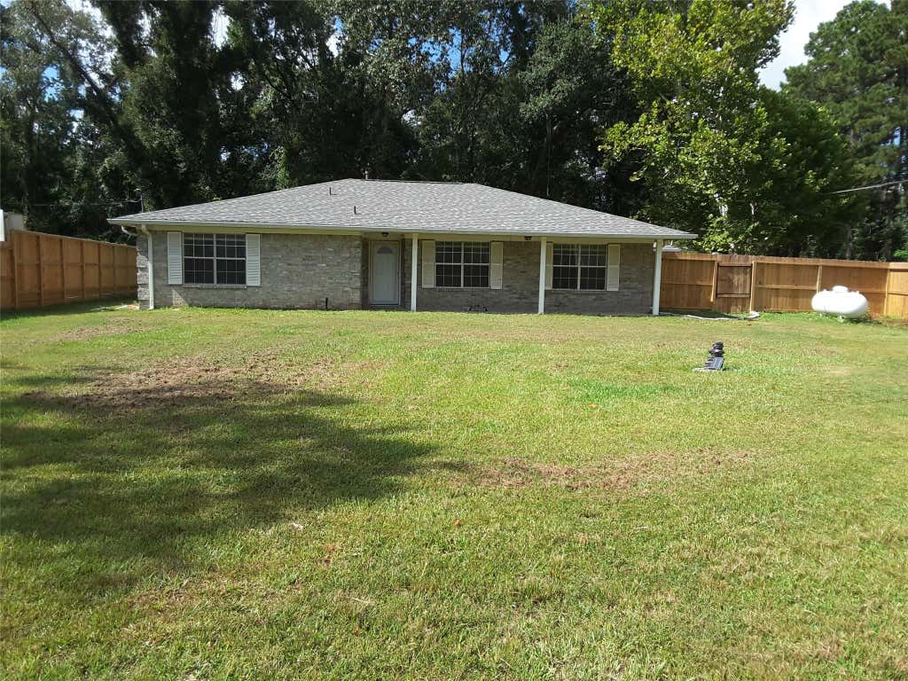 Photo of 18521 Railroad Avenue, New Caney, TX 77357 (MLS # 10750212)
