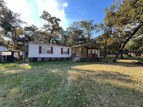 Photo of 66 Mcfaddin Road, Huntsville, TX 77340 (MLS # 4803241)