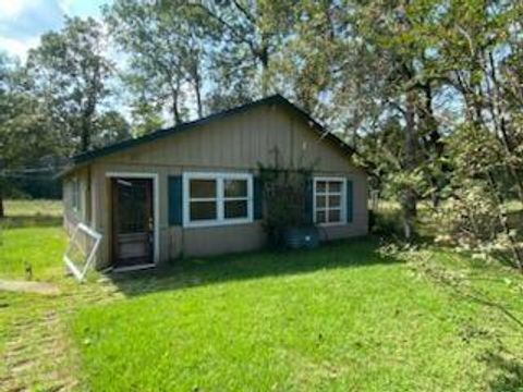 Photo of 6 Post Oak Dr, Huntsville, TX 77320 (MLS # 18936534)