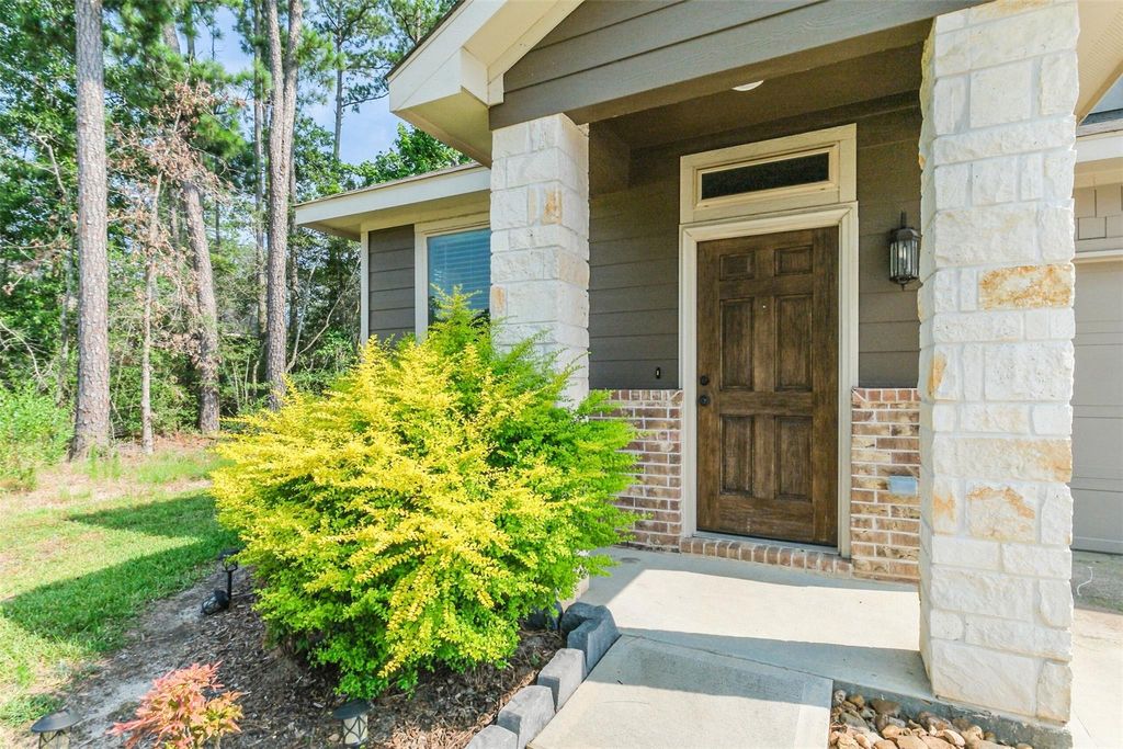Photo of 121 Wickersham #A, Conroe, TX 77304 (MLS # 83283651)