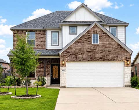 Photo of 18438 Windy Knoll Way, Houston, TX 77084 (MLS # 34899328)