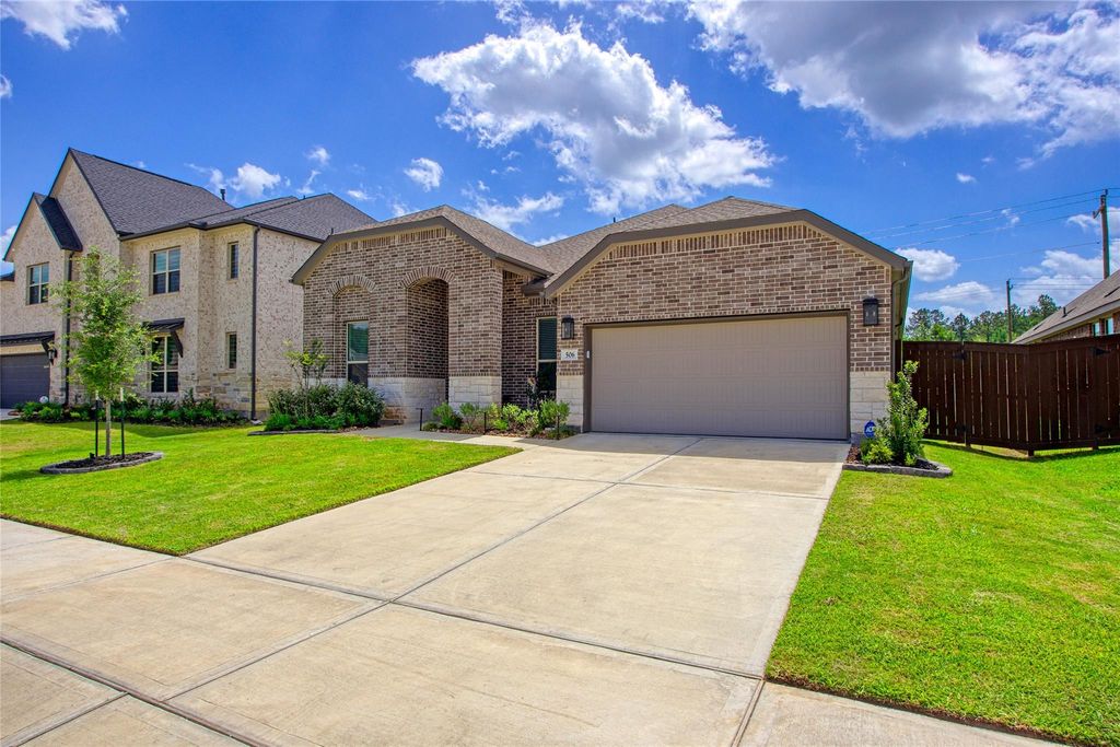 Photo of 506 Boot Springs Drive, New Caney, TX 77357 (MLS # 26347889)