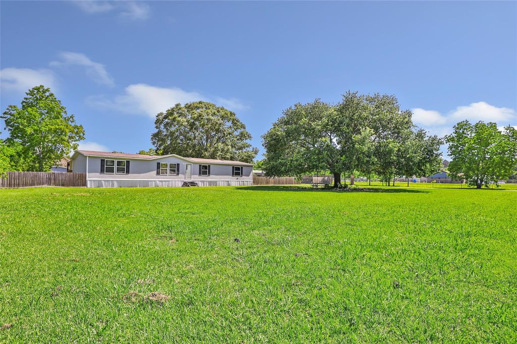 Photo of 2213 Iron Ore Drive, Huffman, TX 77336 (MLS # 74552540)
