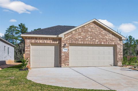 Photo of 9718 Enclave Ridge Road, Willis, TX 77318 (MLS # 83758089)