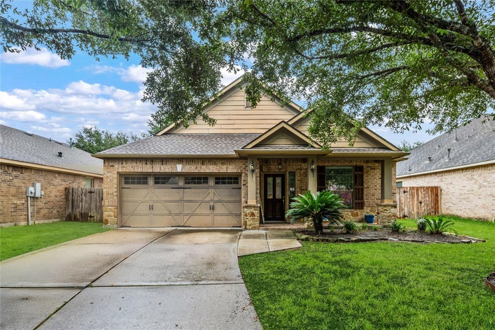 Photo 1 of 24 — 24487 Sundance Spring Drive, Porter, TX 77365