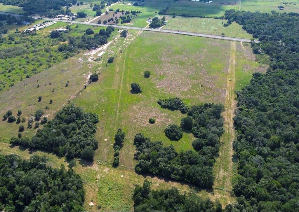 Photo of TBD Us Highway 77s, Hallettsville, TX 77964 (MLS # 25651682)