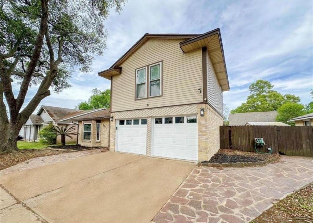 Photo of 7311 Fuchsia Lane, Humble, TX 77346 (MLS # 97169131)