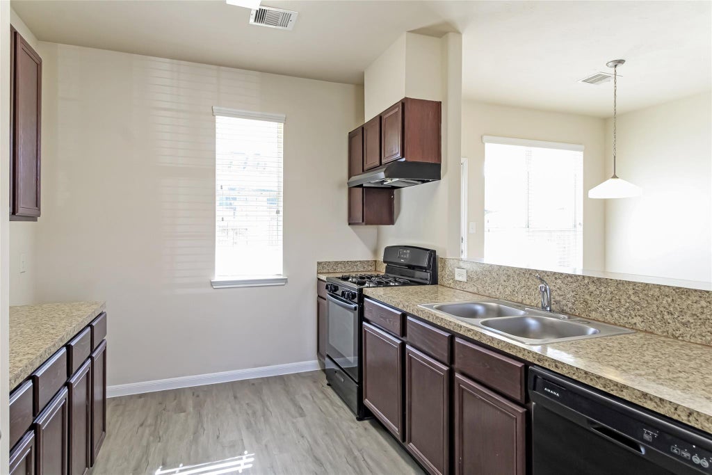 Photo of 12411 Dona Lane, Houston, TX 77044 (MLS # 80070053)