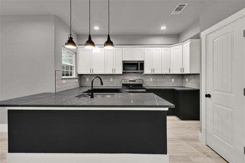 Photo of 7415 Hezekiah Ln LN #B, Houston, TX 77088 (MLS # 79538945)