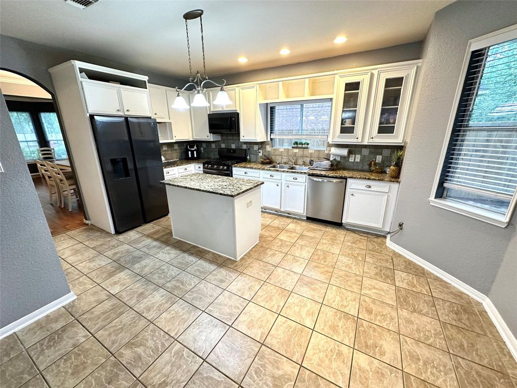 Photo of 26871 Castlecliff Lane, Kingwood, TX 77339 (MLS # 95280478)