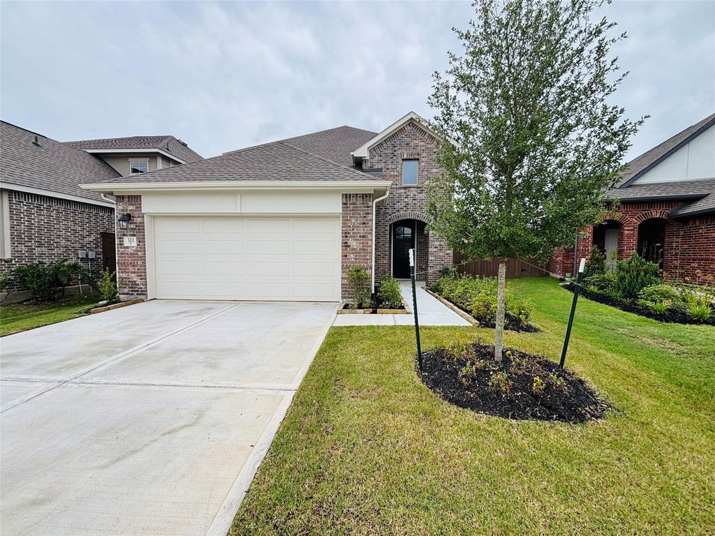 Photo of 311 Violet Crown Lane, New Caney, TX 77357 (MLS # 87300333)