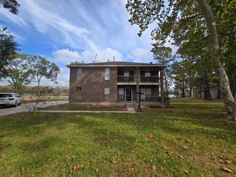 Homes For Sale - 409 Brook Hollow Drive<br/> Conroe, TX 77385