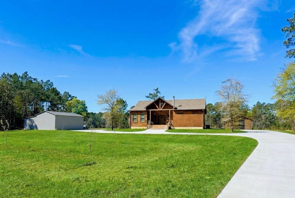 Photo of 214 Hunters Hill Road, Oakhurst, TX 77359 (MLS # 40121464)