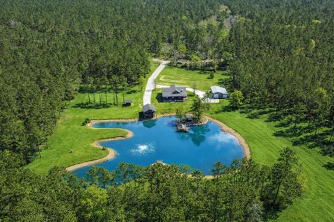 Photo of 214 Hunters Hill Road, Oakhurst, TX 77359 (MLS # 40121464)