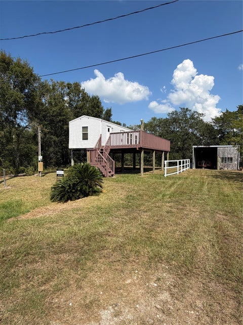 Photo of 613 Troy Street, Anahuac, TX 77514 (MLS # 97379671)