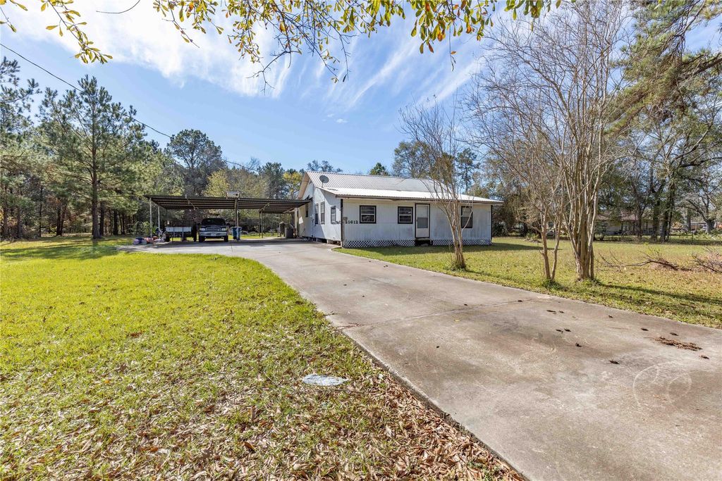 Photo of 21612 Dogwood Drive, New Caney, TX 77357 (MLS # 73522494)