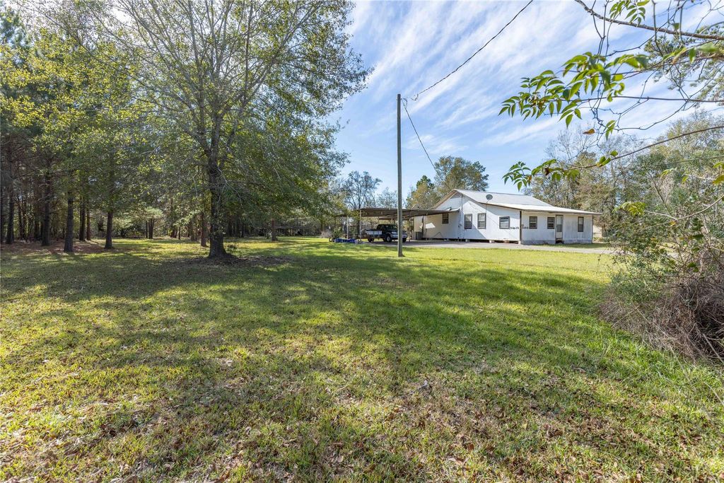 Photo of 21612 Dogwood Drive, New Caney, TX 77357 (MLS # 73522494)