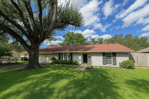Photo of 9646 Meadowglen Lane, Houston, TX 77063 (MLS # 19180929)