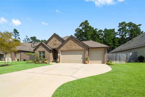 Photo of 725 Ivory Creek Court, Willis, TX 77378 (MLS # 61971664)
