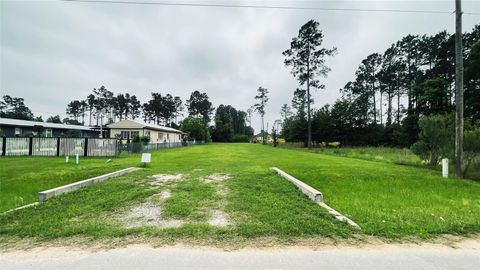 Photo of 48 Road 5027, Cleveland, TX 77327 (MLS # 46819689)