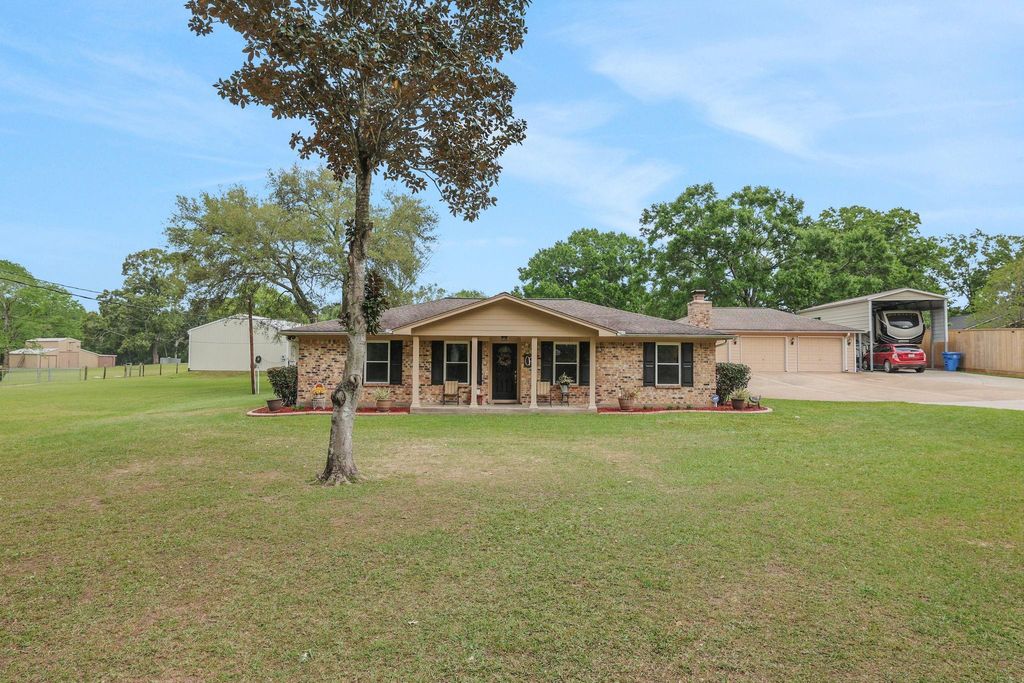 Photo of 31637 Bohlssen Road, New Caney, TX 77357 (MLS # 55308925)