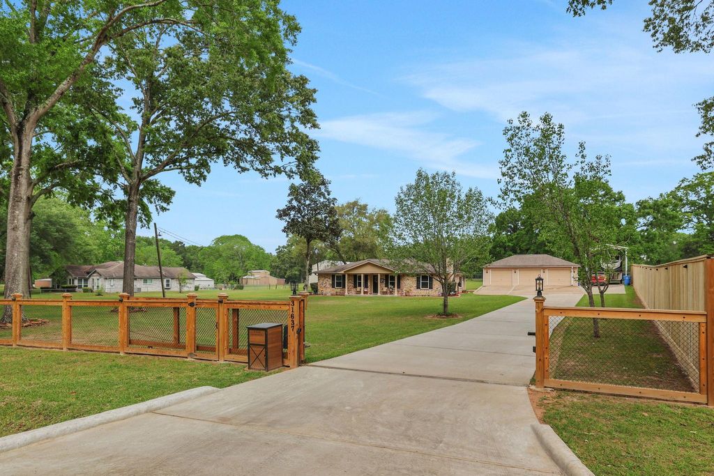 Photo of 31637 Bohlssen Road, New Caney, TX 77357 (MLS # 55308925)