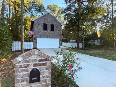 Photo of 15583 Arrowhead Loop W, Willis, TX 77378 (MLS # 56984067)